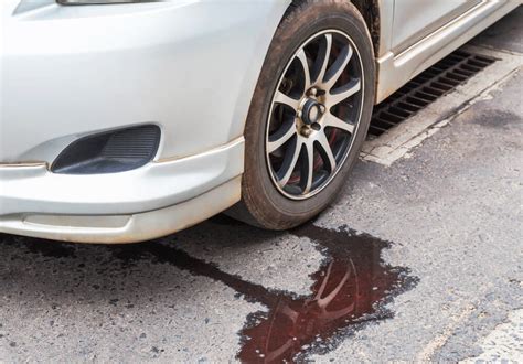 reddish brown fluid leaking from car|Identifying Liquid Leaks: A Guide for Your Car